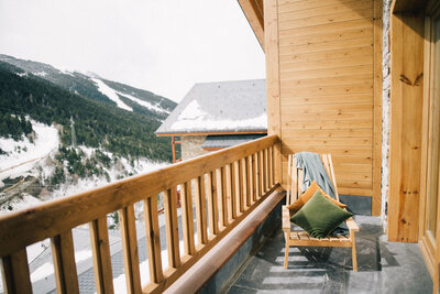 A photo of balcony and snow capped mountains in Vermont