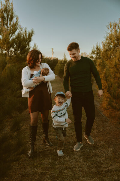 Family Christmas themed photoshoot at W-8 Christmas Tree Farm in Buffalo Gap, TX