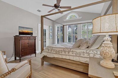 The Primary Bedroom featuring neutral, coastal decor