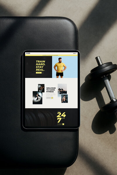 Homepage layout of Gains Showit website template for gyms and fitness coaches.