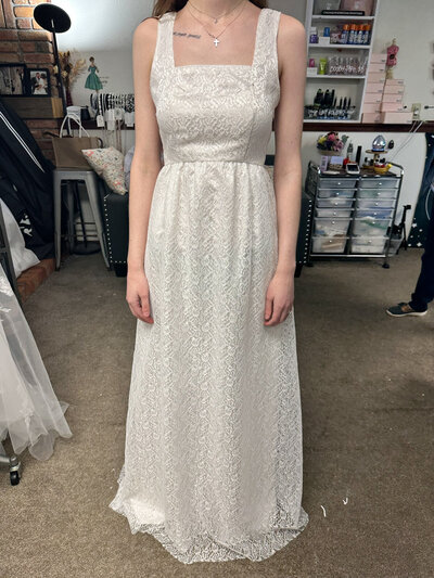 Wedding gown preserved in a display box with lace details