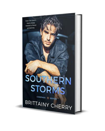 man with beard wearing a white shirt looks down on the cover of the air he breathes by romance author brittainy cherry