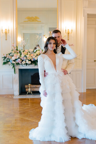 Newport Rhode Island Wedding Photographers | Rhode Island Caprio Captured Photography | Groom Holding Bride's Waist At Glen Manor's Ballroom