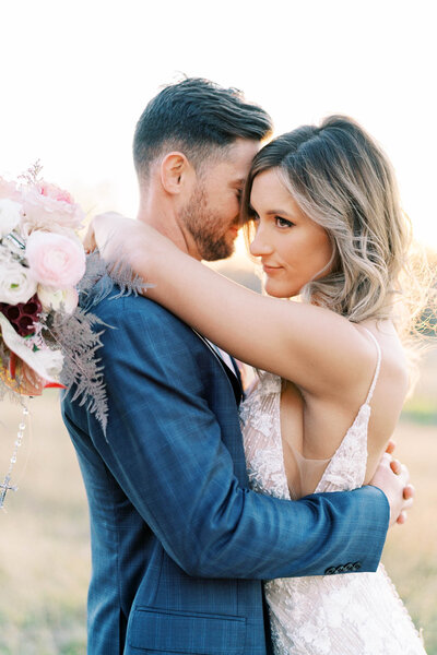 Luxury wedding  image of bride and groom photographed by a Texas film wedding photographer and edited by private photo editors Cultivated Edits