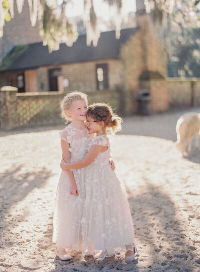 Blush flower girl dresses with floral appliques for a Southern wedding in autumn