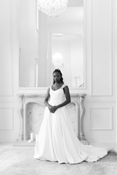 a bride posing in her wedding dress