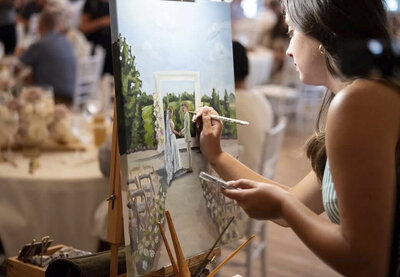 Sloan painting on a canvas