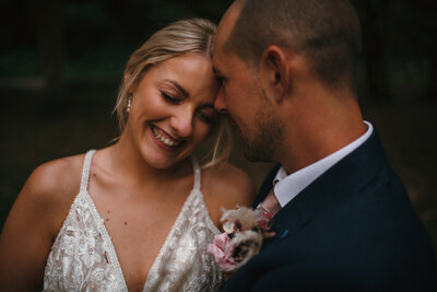 Close up of newly wed couple at their wedding in Cornwall