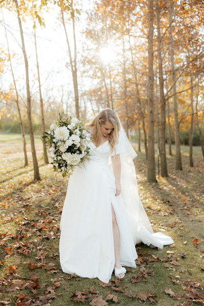 A bride looking at her shoes.