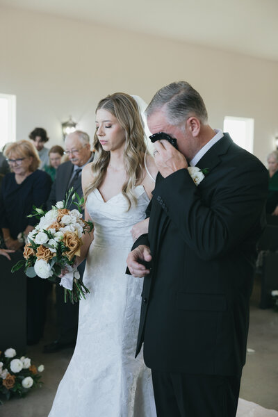 bride and dad in ceremony