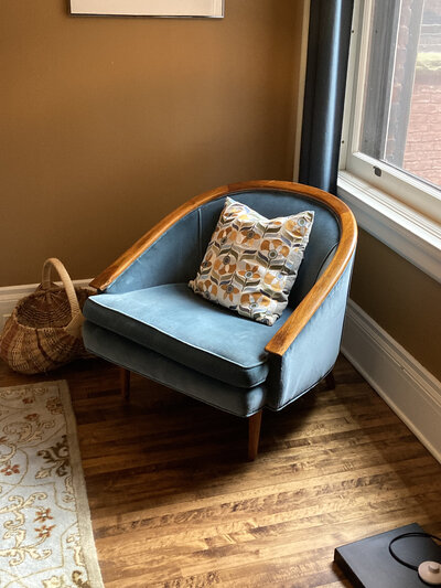 Blue chair in living room of a Minneapolis vintage home
