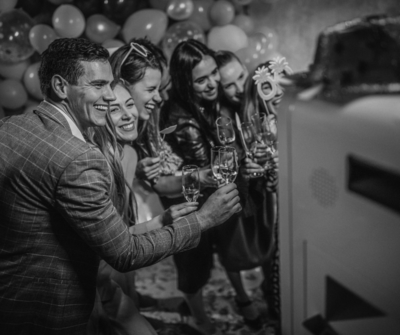 Premium wedding photo booth with custom overlays and props
