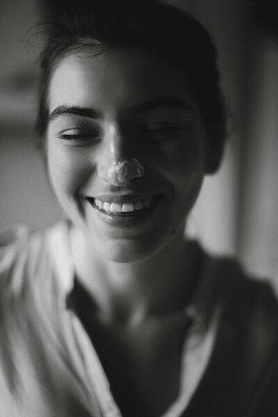 Happy woman after receiving a skincare facial treatment