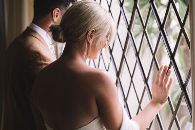 Timeless wedding photography capturing candid moments between the bride and groom