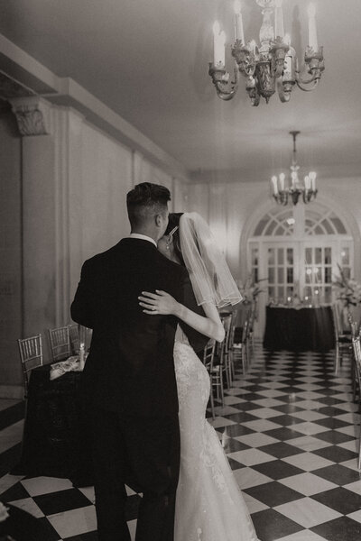 The Mansion at Woodward Park romantic wedding. Couple in wedding attire together on the wedding dance floor