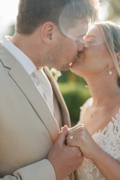 bride and groom kiss