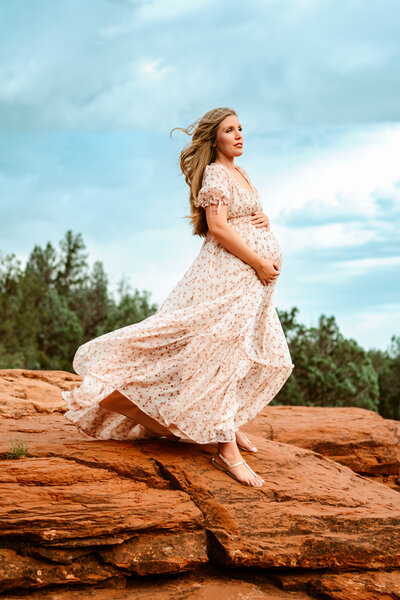 family on rocks with baby