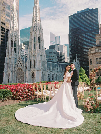 Bride and groom at 620 Loft and Garden for wedding ceremony overlooking St Patrick's Cathedral in NYC