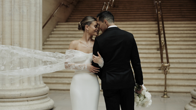 Bride and groom look into each others eyes in downtown Chicago Ceremony
