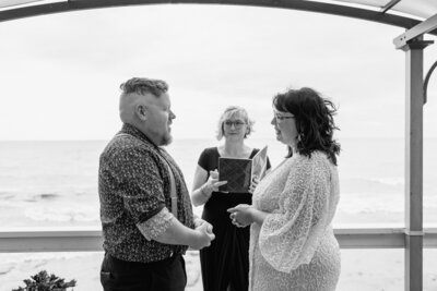 Bride and groom share vows by Lake Erie