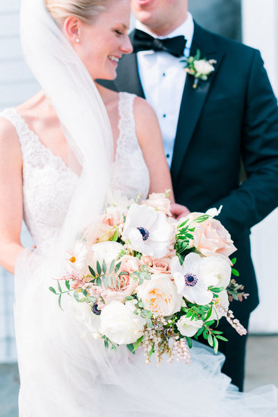 Bride and groom walk up memorial steps at their DC wedding