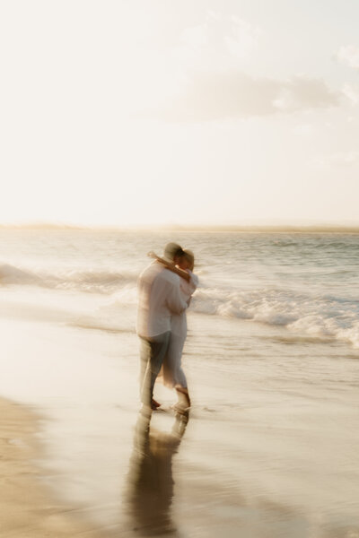Couple get engaged on a Noosa beach at the Sunshine Coast - Sunshine Coast Wedding Photographer