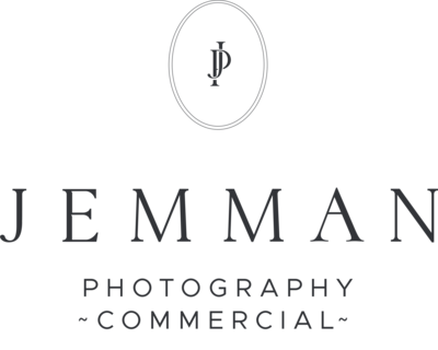 Ottawa headshot photographer logo for JEMMAN Photography showing a black oval with a black J and P monogram