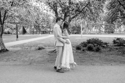 Bride and groom walk up memorial steps at their DC wedding