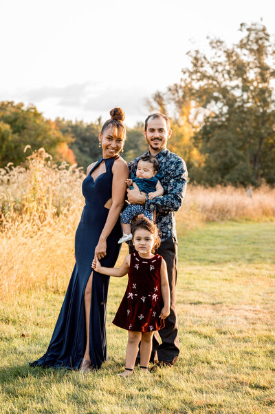family smiling at their new haven ct family photoshoot