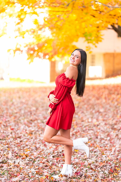 High School Senior girl looking over shoulder