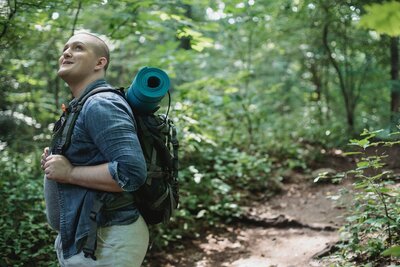 A man appears excited to embark on a reflective retreat