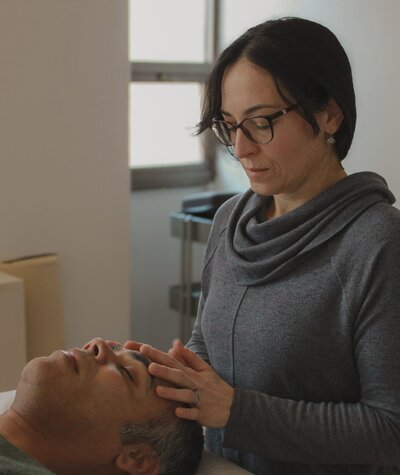 Upledger CranioSacral Therapy frontal bone technique.