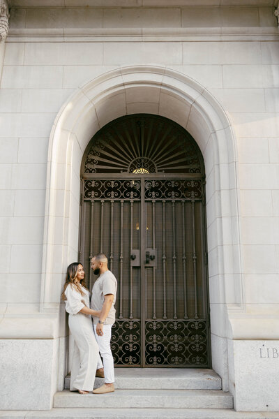Elegant Couple in White Attire Captured During a City Elopement
