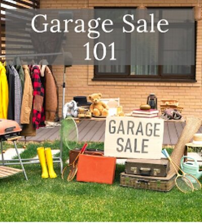 Garage sale items next to a sign that says "Garage Sale"