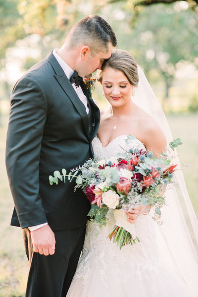 bride and groom romantic portraits at Chateau Cocomar in Houston
