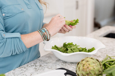 Amy prepping salad