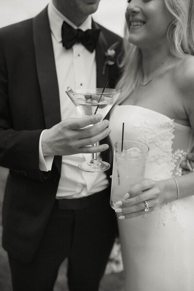 couple celebrating with champagne, their 5th wedding anniversary in southern california.