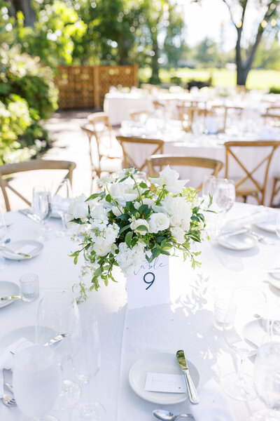 Wedding and Elopement Photography, cake display table with floral arrangement
