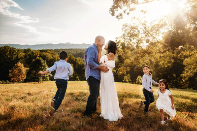Expectant Parents  pose for Maternity Portraits on the Blue Ridge Parkway in Asheville, NC.