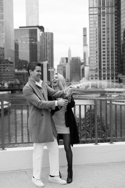 Couple engaged in a romantic moment during a city engagement shoot in Chicago, captured by a Miami wedding photographer.