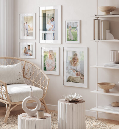 gallery wall of maternity and newborn pictures in a living room available from Indianapolis photographer Brittney Lear