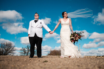 couple posing for wedding photo in winter