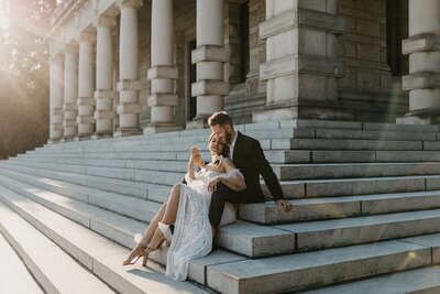 bridal couple walking through grass