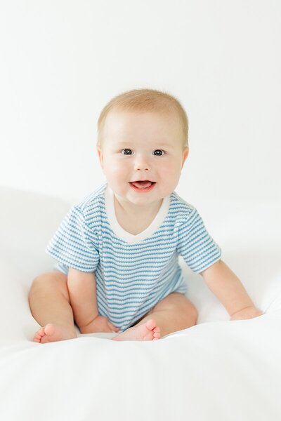 baby photographer for studio milestone for six month old little boy