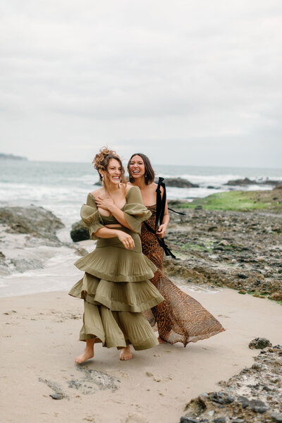 Gorgeous queer couple beach engagement photos Monterey