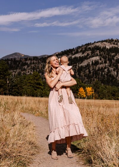 mother holding her daughter