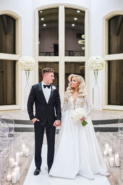 Bride and groom walk up memorial steps at their DC wedding