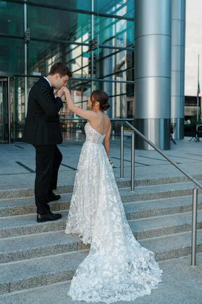 A couple is posing for their downtown Chicago wedding at RPM Events.