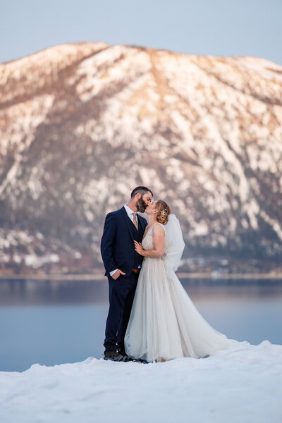 This couple eloped at sunset in Lake Tahoe during the winter.