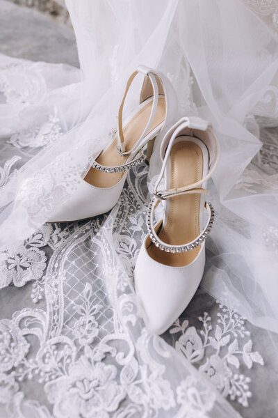 luxury all white wedding bridal shoes, lace, vail